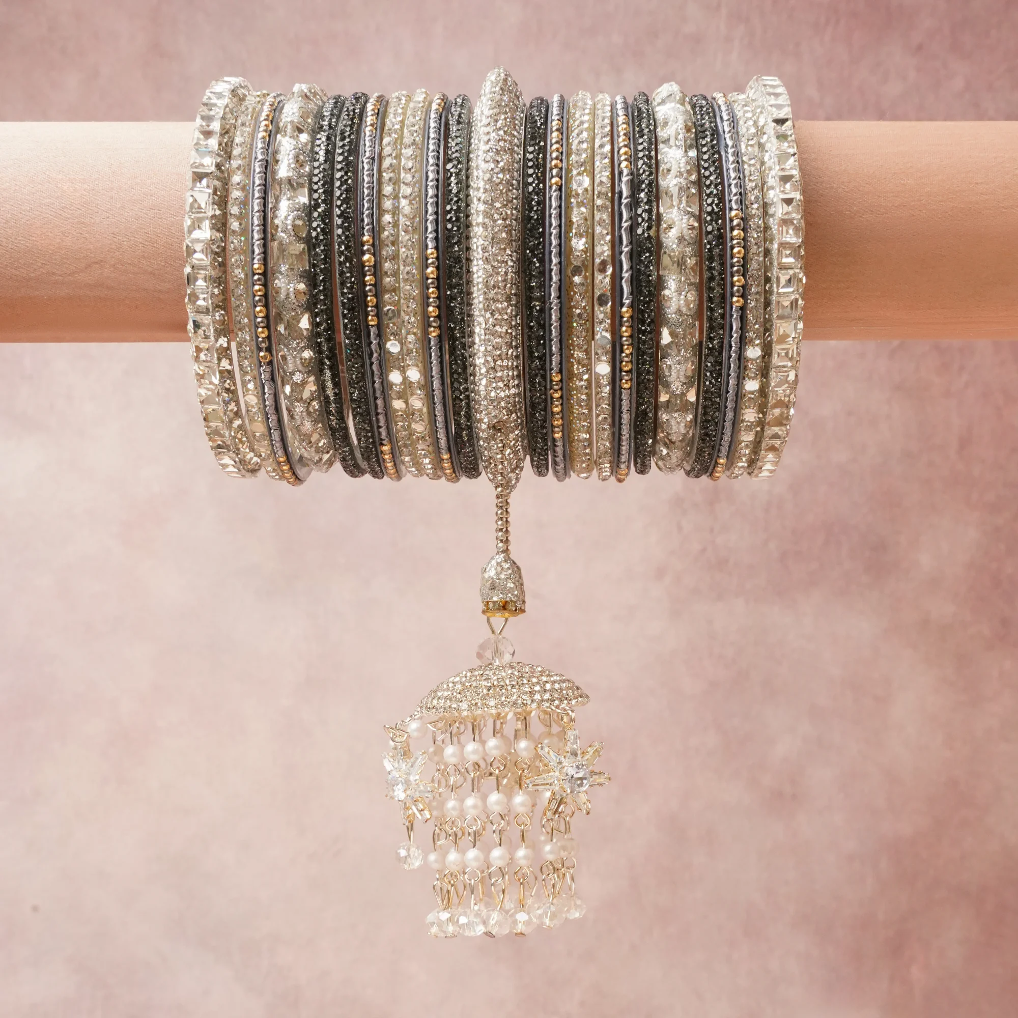 A commanding Anthracite Grey anchors this beautiful set, enriched with accents of Clear Crystal, Ivory Pearl that add depth and dimension.

Featuring a striking composition of Silver-tone Metal Alloy, Glass Crystal, Simulated Pearl, Enamel, this set carries intricate craftsmanship and strong presence. Grand in form, it is created for moments that deserve to be marked.